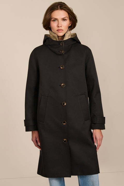 women's plaid-trim raincoat with a hood, stand collar, button-front closure, welt pockets and adjustable cuff tabs.
