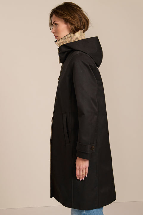 women's plaid-trim raincoat with a hood, stand collar, button-front closure, welt pockets and adjustable cuff tabs.