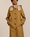 women's plaid-trim raincoat with a hood, stand collar, button-front closure, welt pockets and adjustable cuff tabs.