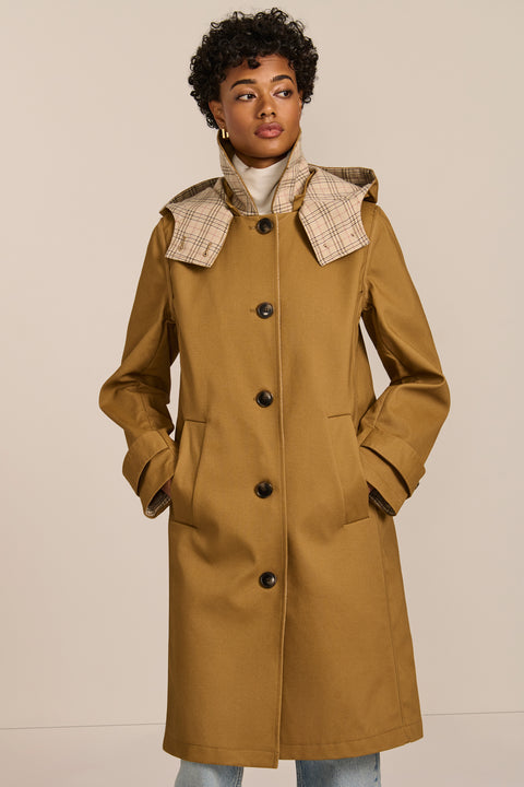 women's plaid-trim raincoat with a hood, stand collar, button-front closure, welt pockets and adjustable cuff tabs.