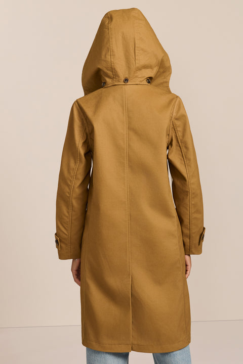 women's plaid-trim raincoat with a hood, stand collar, button-front closure, welt pockets and adjustable cuff tabs.