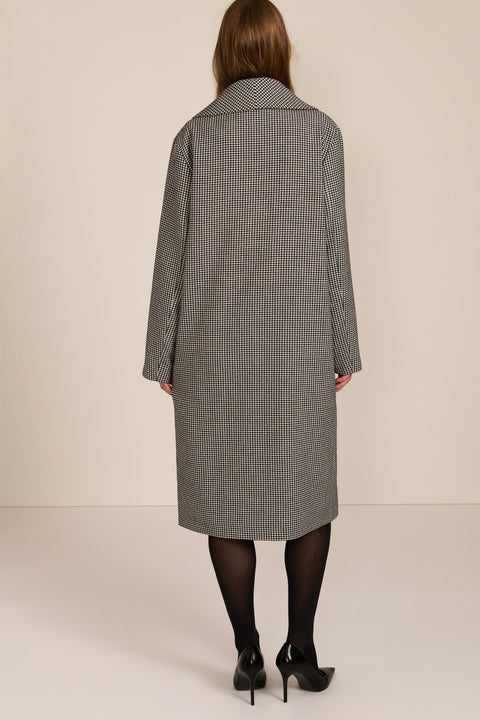 Women's brown houndstooth long coat with oversized notched collar, two-button closure and welt pockets.