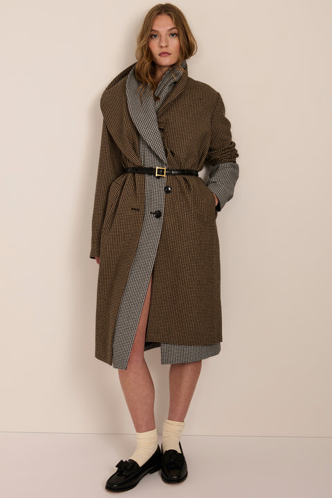 Women's brown houndstooth long coat with oversized notched collar, two-button closure and welt pockets.