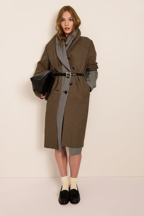 Women's brown houndstooth long coat with oversized notched collar, two-button closure and welt pockets.