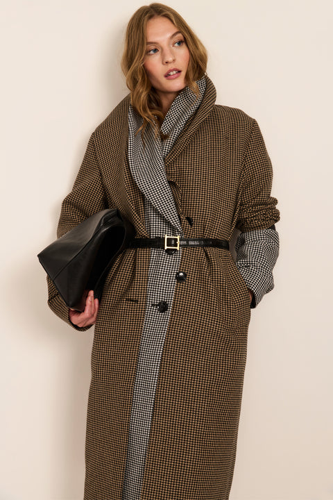 Women's brown houndstooth long coat with oversized notched collar, two-button closure and welt pockets.