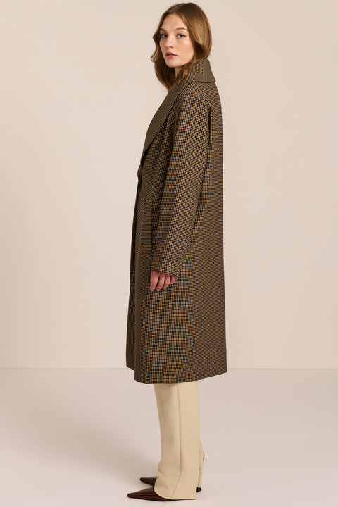 Women's brown houndstooth long coat with oversized notched collar, two-button closure and welt pockets.