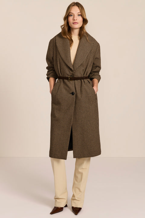 Women's brown houndstooth long coat with oversized notched collar, two-button closure and welt pockets.