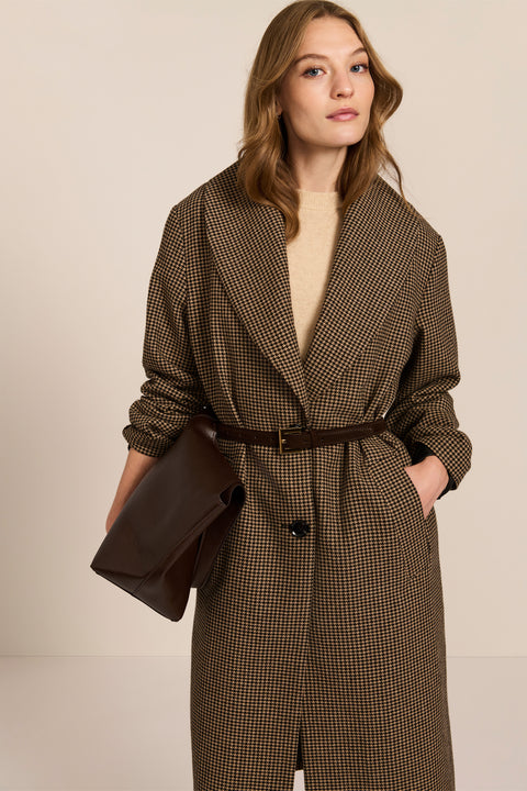 Women's brown houndstooth long coat with oversized notched collar, two-button closure and welt pockets.