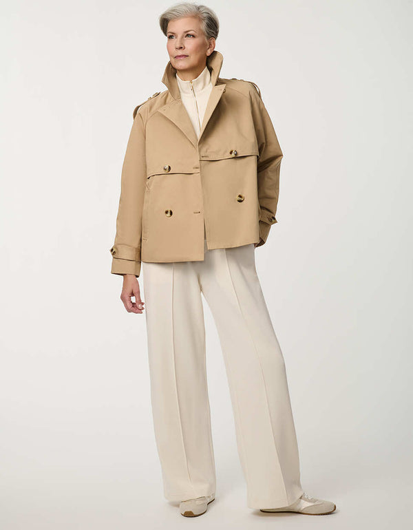 Women’s cropped double-breasted trench jacket with a relaxed fit, designed for spring layering.