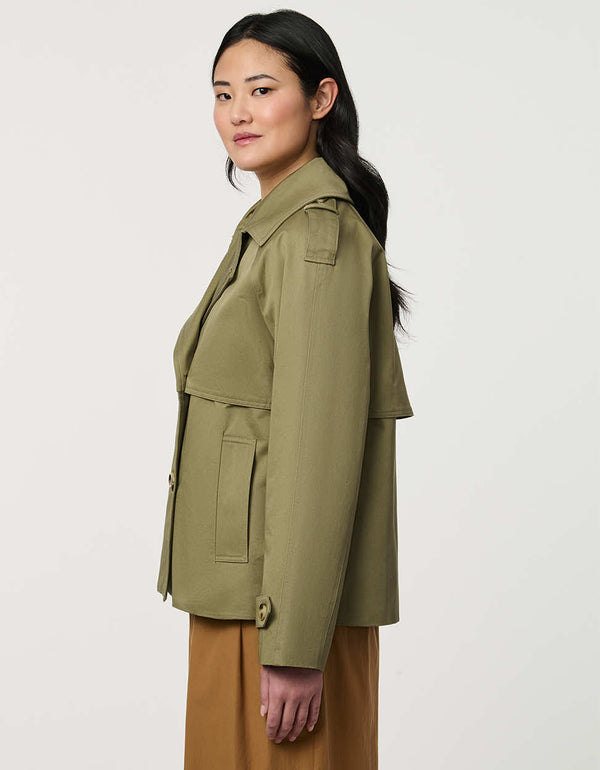 Women’s cropped double-breasted trench jacket with a relaxed fit, designed for spring layering.