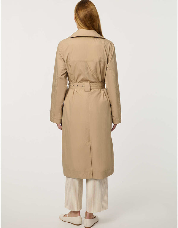 Women’s lightweight utility trench coat with belted waist, flap pockets, and roll-away hood tucked into the collar.