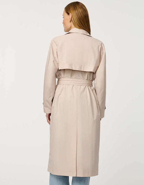 Women’s double-breasted trench coat with belted waist, cuff tabs, and striped interior lining.