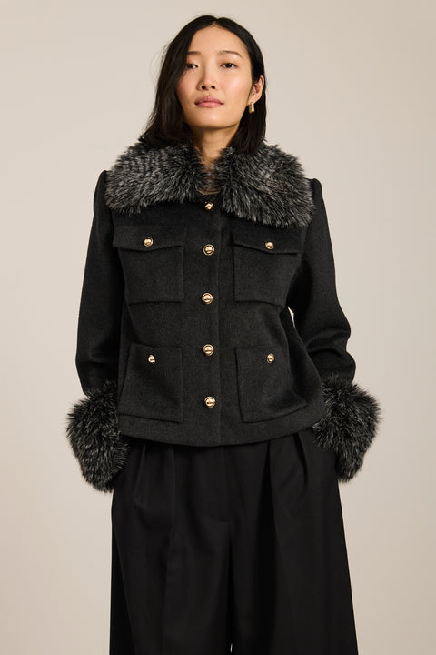 Wool-blend jacket with removable faux fur collar and cuffs, gold-tone buttons and four flap pockets.