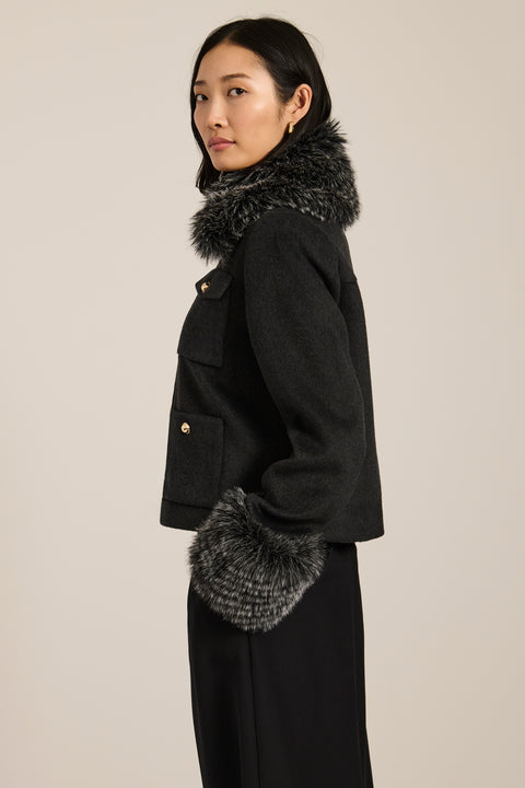 Wool-blend jacket with removable faux fur collar and cuffs, gold-tone buttons and four flap pockets.