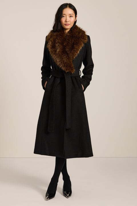 Long belted wool-blend coat with removable faux fur shawl collar, double-breasted front and tailored silhouette.