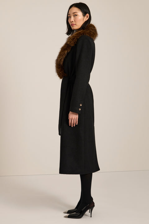 Long belted wool-blend coat with removable faux fur shawl collar, double-breasted front and tailored silhouette.