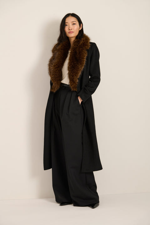 Long belted wool-blend coat with removable faux fur shawl collar, double-breasted front and tailored silhouette.