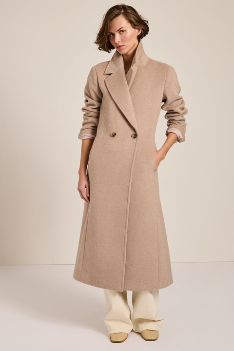 Long belted wool-blend coat with removable faux fur shawl collar, double-breasted front and tailored silhouette.