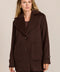 Women's chocolate brown oversized wool-blend coat with notched lapels, patch pockets and button-tab cuffs.