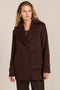 Women's chocolate brown oversized wool-blend coat with notched lapels, patch pockets and button-tab cuffs.
