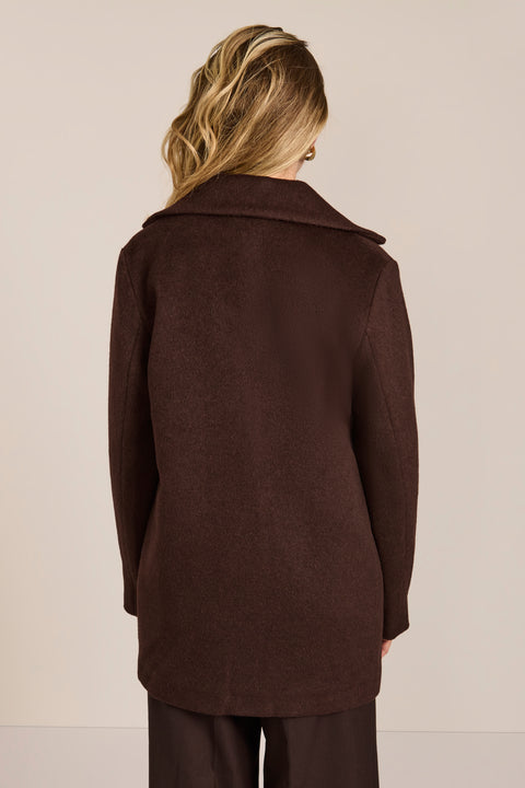 Women's chocolate brown oversized wool-blend coat with notched lapels, patch pockets and button-tab cuffs.