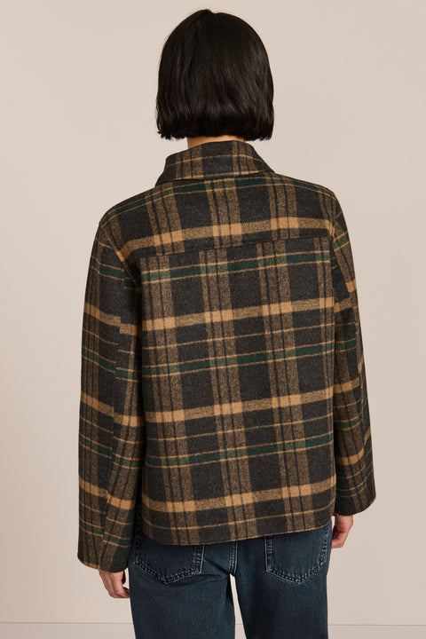 women's cropped plaid wool jacket featuring a point collar, button-front closure, and oversized flap pockets.