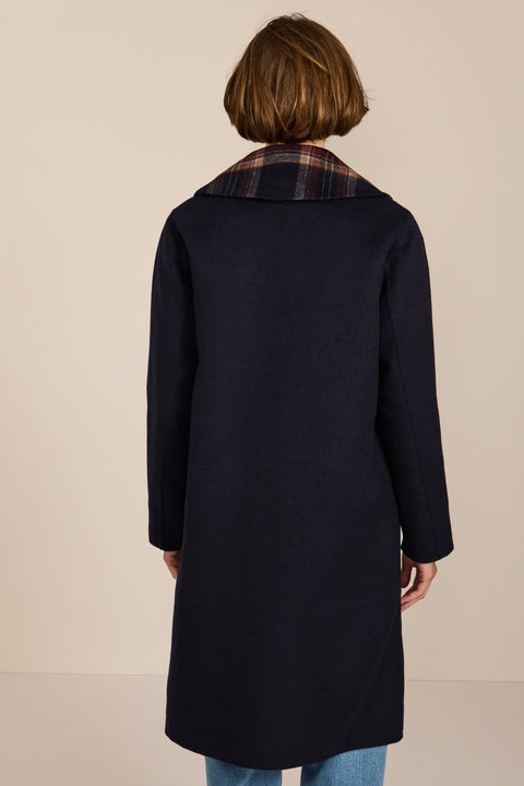 women's double-breasted wool coat with an oversized plaid notched collar, contrasting plaid interior and side pockets.