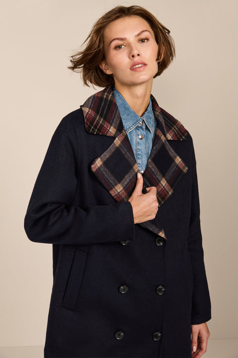 women's double-breasted wool coat with an oversized plaid notched collar, contrasting plaid interior and side pockets.