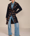 women's double-breasted wool coat with an oversized plaid notched collar, contrasting plaid interior and side pockets.