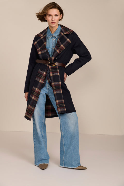 women's double-breasted wool coat with an oversized plaid notched collar, contrasting plaid interior and side pockets.