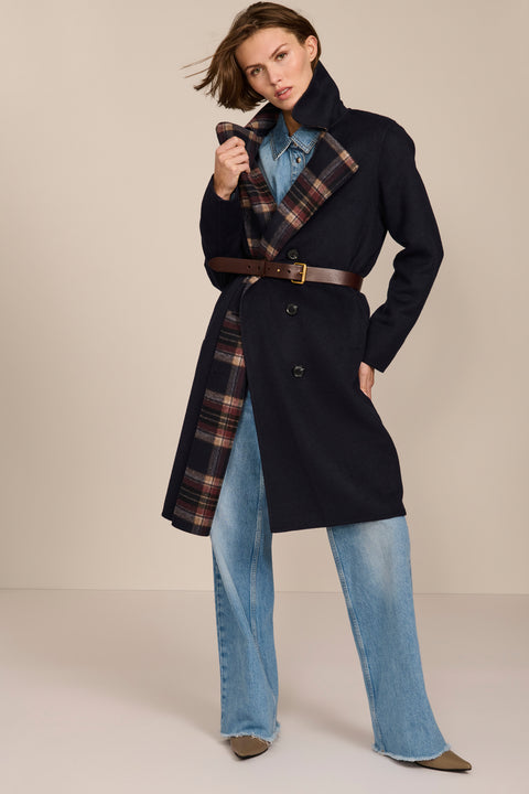 women's double-breasted wool coat with an oversized plaid notched collar, contrasting plaid interior and side pockets.