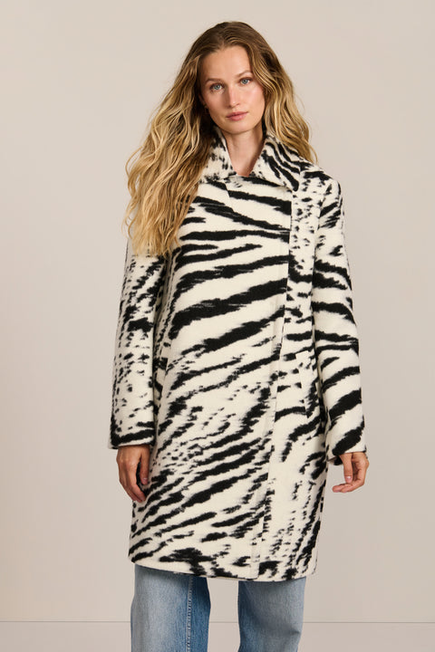 women's tiger print wool coat featuring a streamlined silhouette, pointed collar, concealed front closure and side pockets.