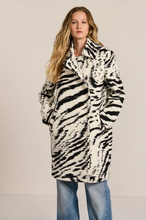 women's tiger print wool coat featuring a streamlined silhouette, pointed collar, concealed front closure and side pockets.