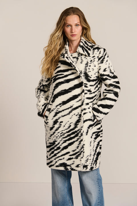 women's tiger print wool coat featuring a streamlined silhouette, pointed collar, concealed front closure and side pockets.