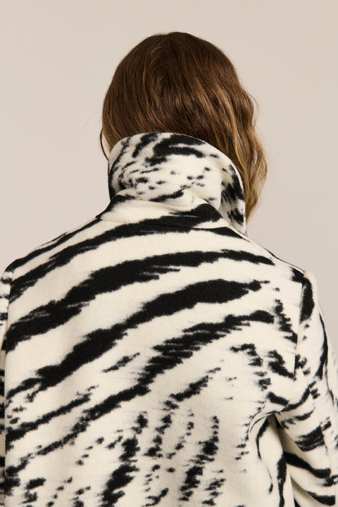 women's tiger print wool coat featuring a streamlined silhouette, pointed collar, concealed front closure and side pockets.