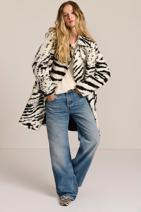 women's tiger print wool coat featuring a streamlined silhouette, pointed collar, concealed front closure and side pockets.