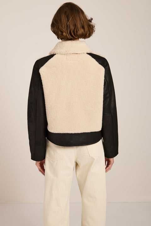 Women's faux shearling and faux leather jacket with zip front and oversized collar in ivory and black