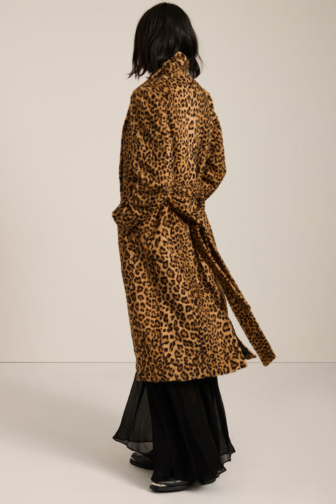 Leopard print faux fur wrap coat with notch lapels, removable self-tie belt and side seam pockets.