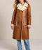 women's faux shearling coat featuring ivory contrast trim, an oversized notched collar, double-breasted button closure and patch pockets.