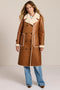 women's faux shearling coat featuring ivory contrast trim, an oversized notched collar, double-breasted button closure and patch pockets.
