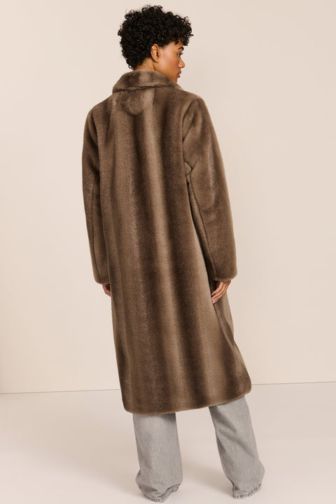 women's long taupe faux fur coat with a wide notched collar, single-breasted front, and side pockets.