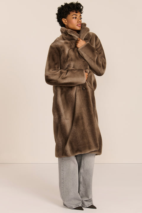 women's long taupe faux fur coat with a wide notched collar, single-breasted front, and side pockets.