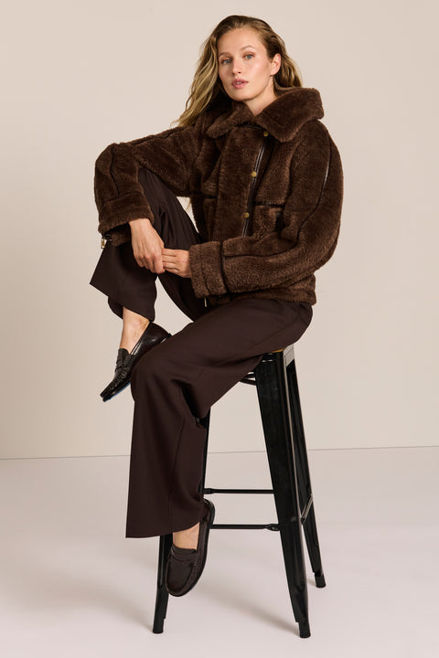 women's Faux Shearling Utility Jacket in chocolate brown with contrast piping, oversized collar and patch pockets.