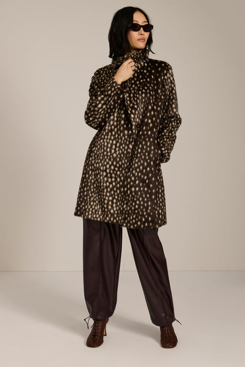 Bambi print faux calf hair tailored coat with notch lapels, single-breasted front and knee-length silhouette.