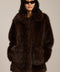 Spotted faux fur coat with oversized notch collar, button-front closure and patch pockets with side entry.
