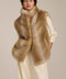 Plush faux fur vest with oversized stand collar, hidden front closure and side seam pockets.