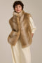 Plush faux fur vest with oversized stand collar, hidden front closure and side seam pockets.