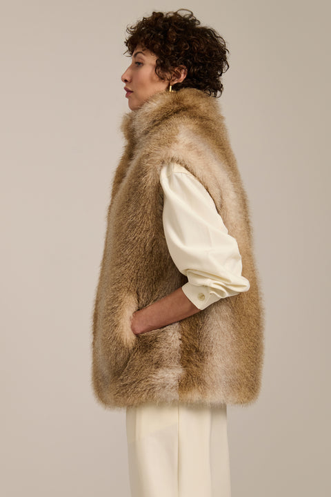 Plush faux fur vest with oversized stand collar, hidden front closure and side seam pockets.