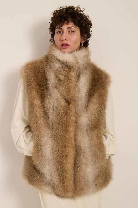 Plush faux fur vest with oversized stand collar, hidden front closure and side seam pockets.