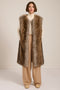 Brown-tipped faux fur long vest with collarless neckline, hook-and-eye closure and side seam pockets.